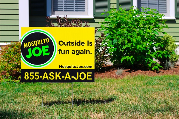 Mosquito Joe yard sign placed on the front lawn of a Missouri home